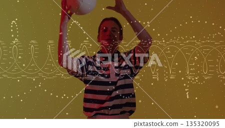 Raising white ball overhead woman wearing striped polo and pants in studio, with data theme Raising white ball overhead woman wearing striped polo and pants in studio, with data theme 135320095