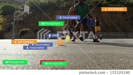 Dribbling player in jersey handling ball on basketball court, with cones, hoop and notifications 135320190