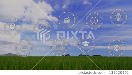 Floating nine outline icons depicting education and analytics hovering above rural crop field, tech Floating nine outline icons depicting education and analytics hovering above rural crop field, tech 135320391