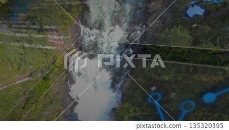 Flowing waterfall cutting through rocky gorge and evergreen forest, with grid lines and blue nodes 135320395