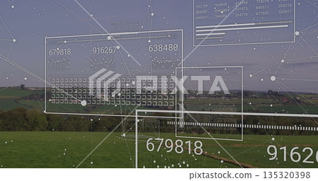 Displaying network interface overlay on rural farms with panels grids data readouts and bar graphs 135320398
