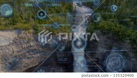 Capturing aerial waterfall plunging through rocky gorge amid evergreen trees and HUD overlays 135320400
