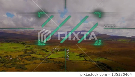 Displaying green heads-up display overlay with corner markers over rural valley with numeric data Displaying green heads-up display overlay with corner markers over rural valley with numeric data 135320404