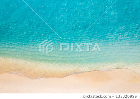 Aerial view tropical beach Mediterranean shore ocean waves sand summer 135320959