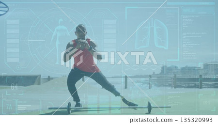 Performing side lunge over barbell, athlete in red top on waterfront deck with prosthetic leg Performing side lunge over barbell, athlete in red top on waterfront deck with prosthetic leg 135320993