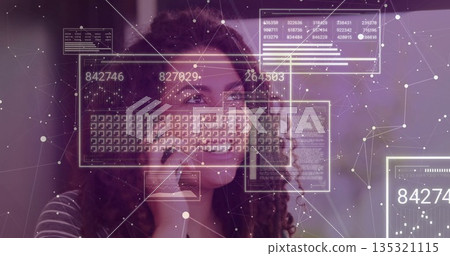 Scanning floating data panels around woman wearing striped shirt in office, with smartphone 135321115
