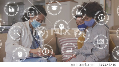 White-coated professional writing on clipboard with pen at home, sofa cushions and floating icons 135321240