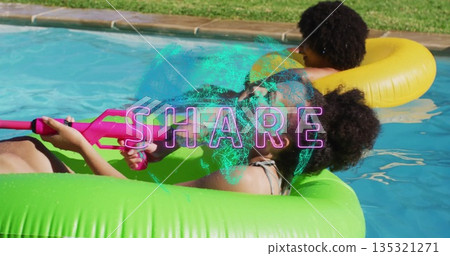 Floating Chinese woman in swimsuit and sunglasses, shooting pink water gun on tube in backyard pool Floating Chinese woman in swimsuit and sunglasses, shooting pink water gun on tube in backyard pool 135321271