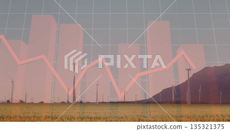 Displaying wind turbines spanning grassy field at mountain base, with translucent financial overlay 135321375