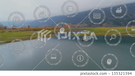 Gliding male boater wearing orange life vest paddling red kayak on calm lake, with digital icons Gliding male boater wearing orange life vest paddling red kayak on calm lake, with digital icons 135321394