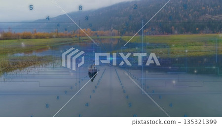 Drifting lone man in wooden rowboat exploring scenic lake valley, with futuristic digital overlay 135321399