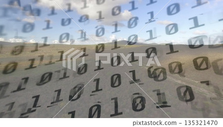 Overlaying translucent binary code drifting over dry plain, with dirt track and rolling hills 135321470