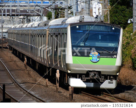 E233 series 7000 series Hae 117 train wrapped in 40th anniversary wrapping for the Saikyo Line on the Yamanote freight line 135321614