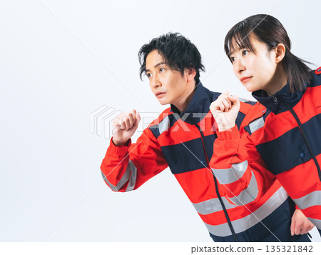 Men and women in running uniforms 135321842