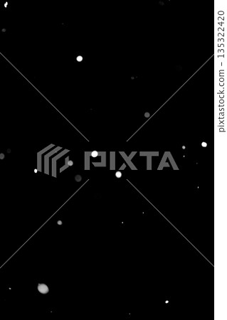 Minimal snow particles on black background 135322420