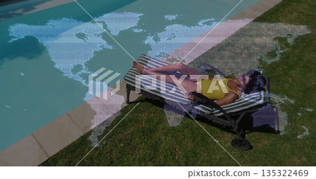 Lying woman wearing yellow swimsuit on striped lounge chair beside stone pool edge, copy space Lying woman wearing yellow swimsuit on striped lounge chair beside stone pool edge, copy space 135322469