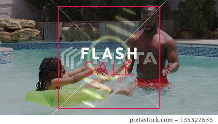 Splashing father in red trunks guiding daughter on green ring in backyard pool, with mosaic tiles Splashing father in red trunks guiding daughter on green ring in backyard pool, with mosaic tiles 135322636