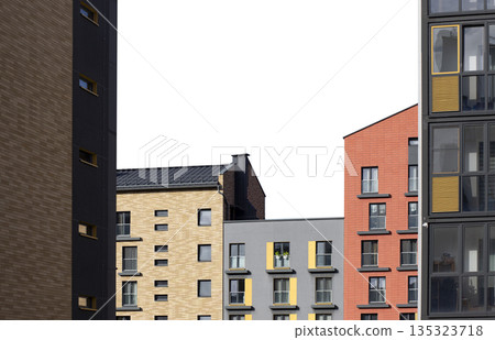 Colorful modern apartment buildings with facades in beige brick, gray, and red tones, accented by Colorful modern apartment buildings with facades in beige brick, gray, and red tones, accented by 135323718
