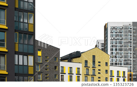 Contemporary residential buildings with diverse facades in gray, yellow, and white tones, combining 135323726