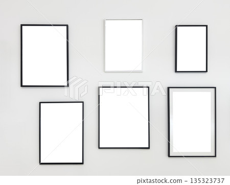 Minimalist composition of six empty photo frames in black and white, arranged on a neutral light 135323737