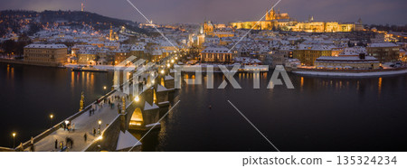 High Resolution Panorama Picture of Winter Snowy Prague Old Town with Prague Castle and Charles Bridge above River Vltava during Sunset , Czech republic High Resolution Panorama Picture of Winter Snowy Prague Old Town with Prague Castle and Charles Bridge above River Vltava during Sunset , Czech republic 135324234