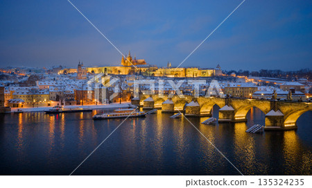 High Resolution Panorama Picture of Winter Snowy Prague Old Town with Prague Castle and Charles Bridge above River Vltava during Sunset , Czech republic 135324235