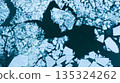 Floating ice Floes on the Frozen Surface of the River in Winter , Aerial Shot 135324262