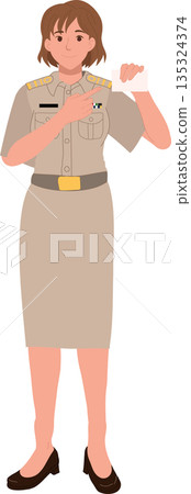a female government officer or civil servant in uniform, standing and holding an ID card a female government officer or civil servant in uniform, standing and holding an ID card 135324374