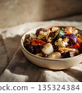 Bowl of roasted vegetables and quinoa placed on craft paper, neutral linen background, soft natural light, warm earthy tones 135324384