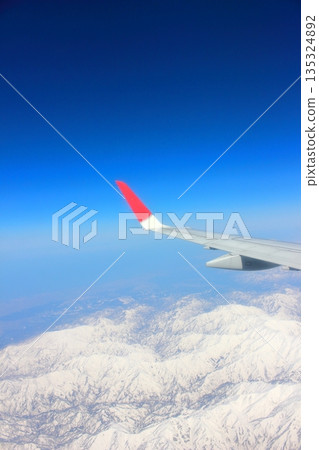 View from the window: Airplane View from the window: Airplane 135324892