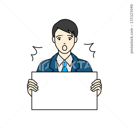 A businessman in a suit with a surprised expression holding a whiteboard 135325040