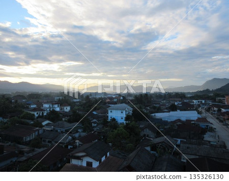 Morning sky and the cityscape of Vang Vieng Morning sky and the cityscape of Vang Vieng 135326130
