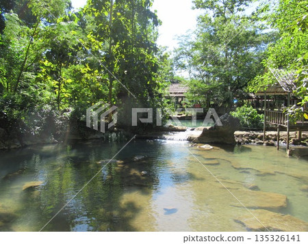 Idyllic Blue Lagoon in Vang Vieng Idyllic Blue Lagoon in Vang Vieng 135326141