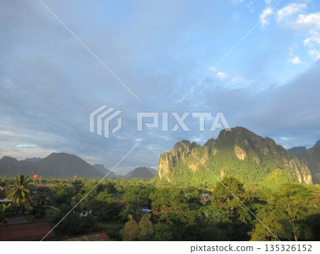 Vang Vieng mountains bathed in the morning sun 135326152