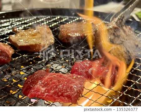 charcoal-grilled meat charcoal-grilled meat 135326377