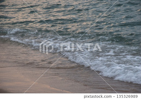 wave splashing to beach on sunset at Rayong estuary or mouth of river travel location in Thailand wave splashing to beach on sunset at Rayong estuary or mouth of river travel location in Thailand 135326989