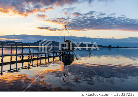 Winter evening view of Lake Togo 135327232