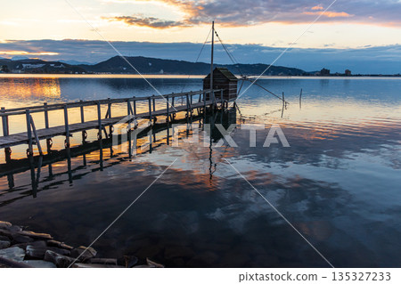 Winter evening view of Lake Togo Winter evening view of Lake Togo 135327233