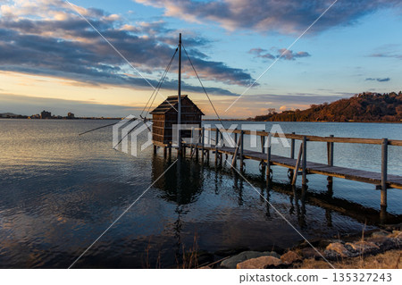 Winter evening view of Lake Togo 135327243