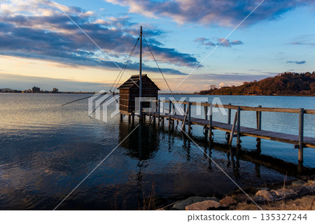 Winter evening view of Lake Togo Winter evening view of Lake Togo 135327244