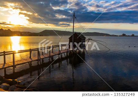 Winter evening view of Lake Togo Winter evening view of Lake Togo 135327249