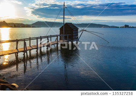 Winter evening view of Lake Togo Winter evening view of Lake Togo 135327258