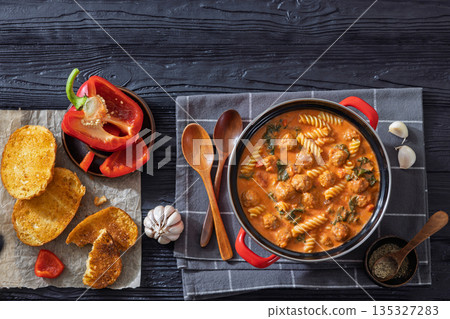 Italian Meatball Fusilli Soup with Toast Top View Italian Meatball Fusilli Soup with Toast Top View 135327283