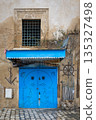 Traditional blue gate in Bizerte medina, Tunisia 135327498