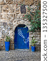 Traditional blue gate in Bizerte medina, Tunisia 135327500