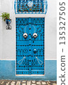 Traditional blue gate in Bizerte medina, Tunisia 135327505