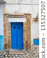 Traditional blue gate in Bizerte medina, Tunisia 135327507