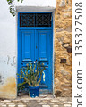 Traditional blue gate in Bizerte medina, Tunisia 135327508