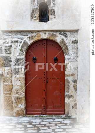Traditional gate in the old town, Bizerte, Tunisia 135327509