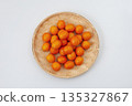 Kumquat tray colander white background 135327867